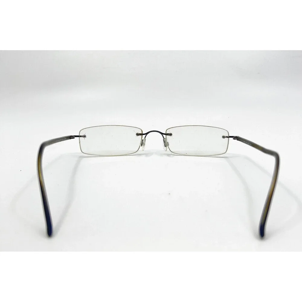 Marchon Airlock 2 Eyeglasses Mens Brown Rimless Rectangle 51-21-140
